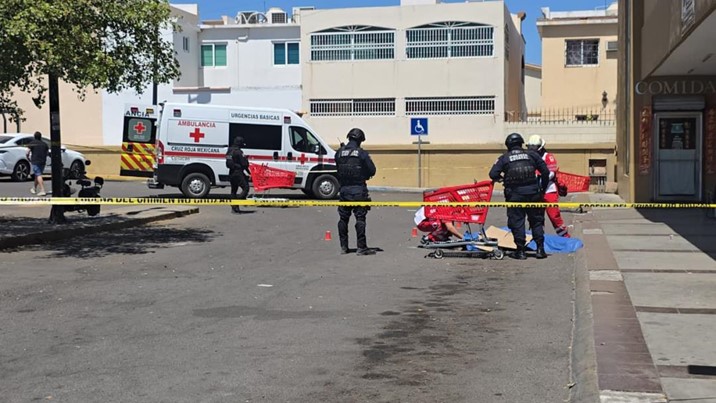  Asesinan a balazos a joven en estacionamiento de supermercado en la 4 de Marzo